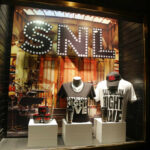 SNL merchandise display in a store window