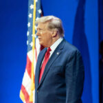 Trump Unleashes Military Might on Cartels Man in suit with American flag background