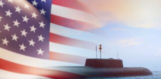 A submarine partially submerged in the ocean with an American flag overlay