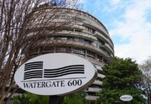 Watergate 600 building with a sign in front