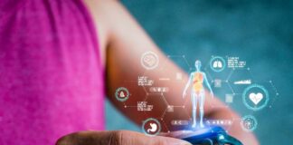 Person using a smartwatch displaying health data and holographic graphics