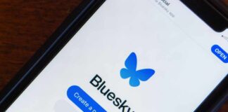 Mobile phone displaying the Bluesky app login screen