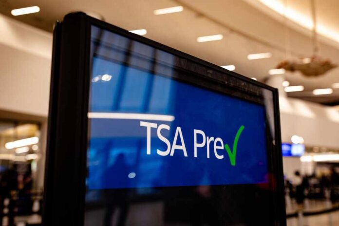 Sign displaying TSA PreCheck information at an airport