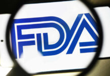 FDA logo under a magnifying glass.