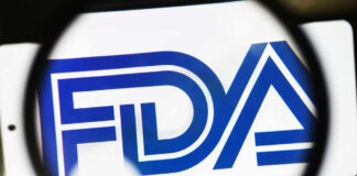 FDA logo under a magnifying glass.
