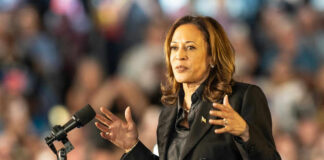 I dont know who this is speaking at podium