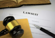 A gavel resting on legal documents related to a lawsuit