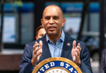 A government official delivering a speech outdoors