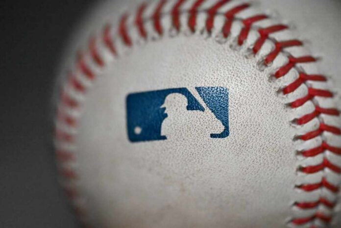 Close-up of a baseball featuring the MLB logo