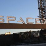 Sign displaying the SpaceX logo at a launch site