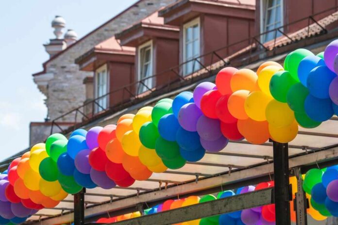 A vibrant display of colorful balloons arranged in a festive arch
