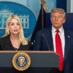 Government officials at a press conference in front of the White House