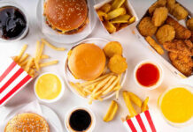 Fast food with burgers fries nuggets and drinks