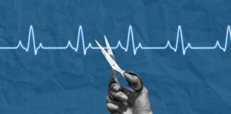 Hand holding scissors near heartbeat line illustration