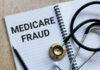 Notebook stethoscope and pen with Medicare Fraud text
