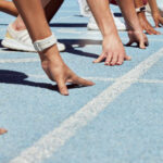 Trans Athlete Podium Standoff Erupts Athletes at starting line on blue track race