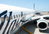 Close-up view of an Alaska Airlines airplane at the airport