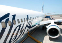 Close-up view of an Alaska Airlines airplane at the airport