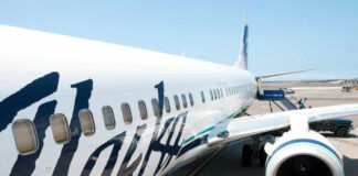 Close-up view of an Alaska Airlines airplane at the airport