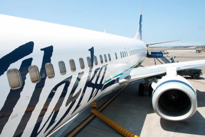 Close-up view of an Alaska Airlines airplane at the airport