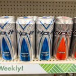 Cans of Rip It energy drinks displayed on a supermarket shelf