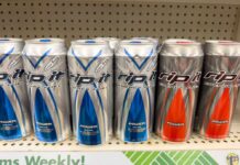 Cans of Rip It energy drinks displayed on a supermarket shelf