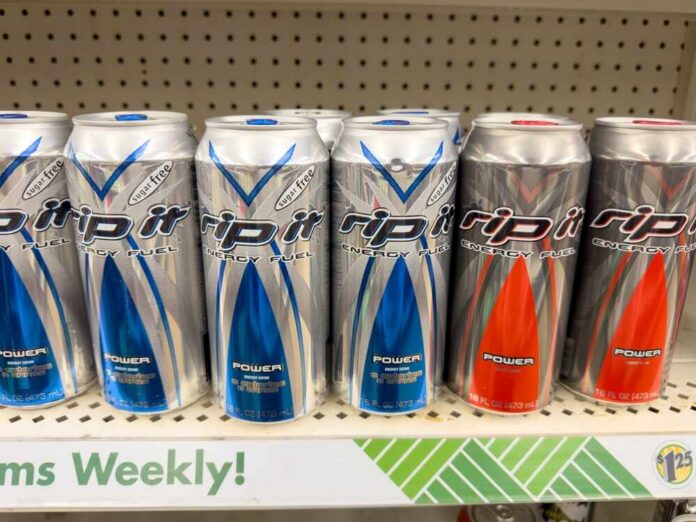 Cans of Rip It energy drinks displayed on a supermarket shelf