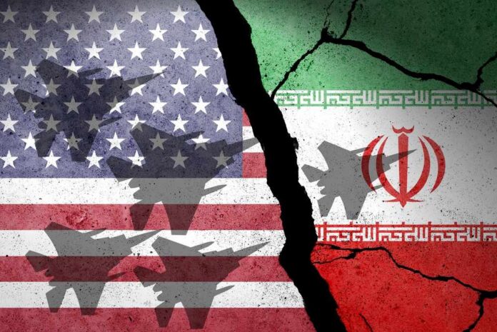 A cracked wall featuring the flags of the United States and Iran, with military aircraft silhouettes