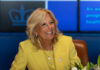 The Bestseller Claim Everyone Is Debating Smiling woman in a yellow blazer at a meeting table