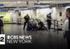 Man in custody after 6 people stabbed at Penn Station