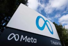 Sign displaying the Meta logo and address at 1 Hacker Way