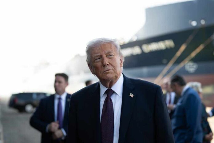 President,Donald,J.,Trump,Delivers,Remarks,On,Energy,At,The A political figure standing outdoors with a serious expression