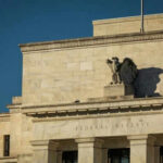 Supreme Court Weighs Who Controls The Fed Federal Reserve building exterior with eagle sculpture