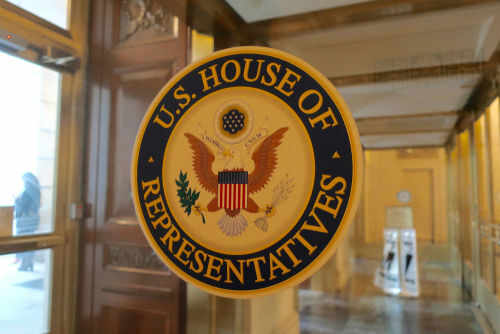 us-house-of-representative1381876346 US House of Representatives seal on glass door