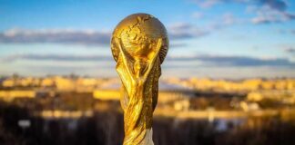 Golden soccer world cup trophy outdoors