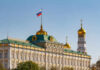 Refinery Meltdown Hits Putin’s War Machine The Kremlin building with the Russian flag and golden domes in the background