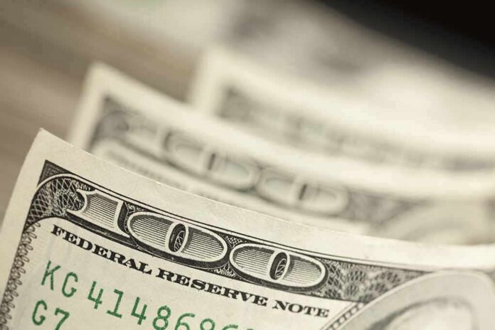 Stack of U.S. hundred dollar bills in close-up