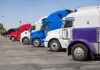 A lineup of colorful trucks parked in a lot
