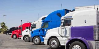 A lineup of colorful trucks parked in a lot