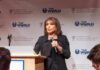 Things Just Got Awkward Inside Trump’s Circle Woman speaking at a podium with microphone