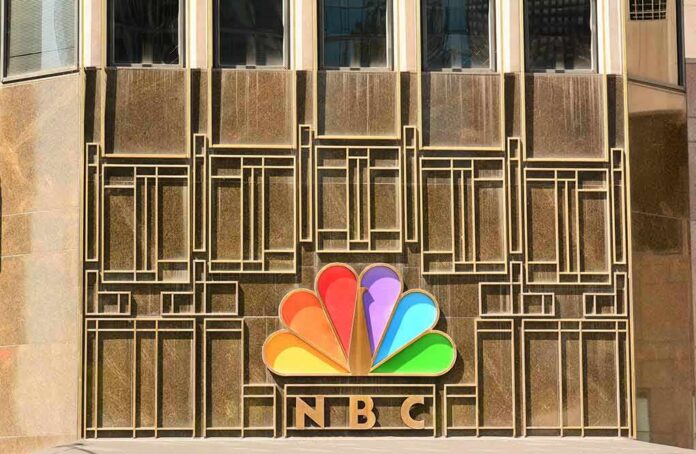 NBC peacock logo on building facade