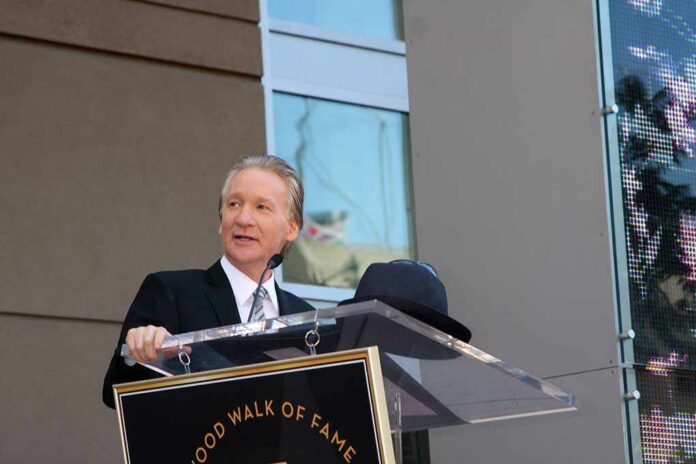 Los,Angeles,-,Sep,14:,Bill,Maher,At,The,Bill A man in formal attire speaking at a podium during a Hollywood Walk of Fame ceremony