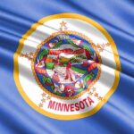 Minnesota state flag with detailed seal on blue field