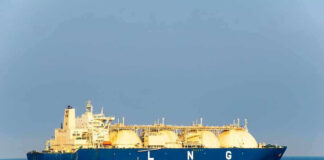 LNG tanker ship sailing on open sea.
