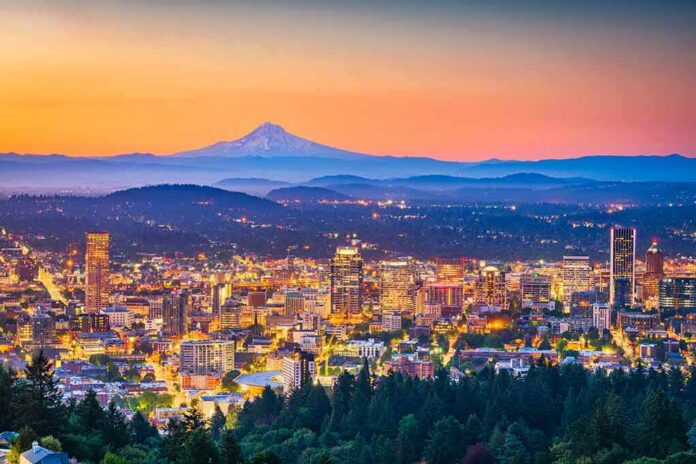 City skyline at dusk with mountain in the distance