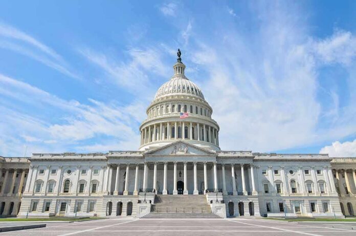 United States Capitol building with dome under a blue sky