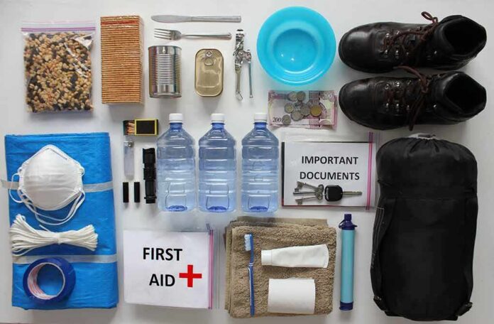 Emergency kit items organized on a white surface