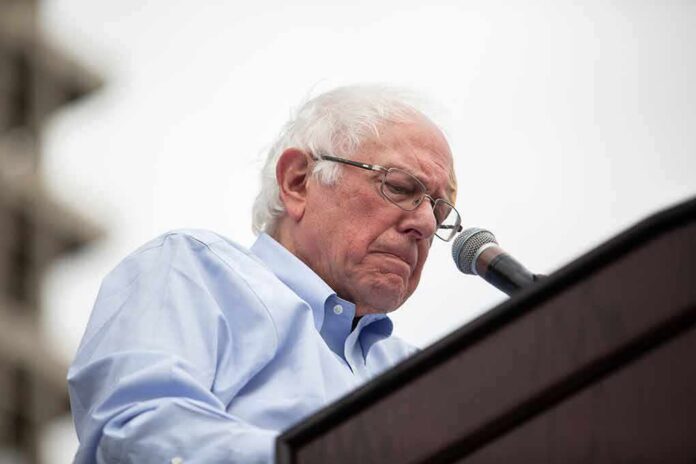 elderly man speaking at a podium with a microphone