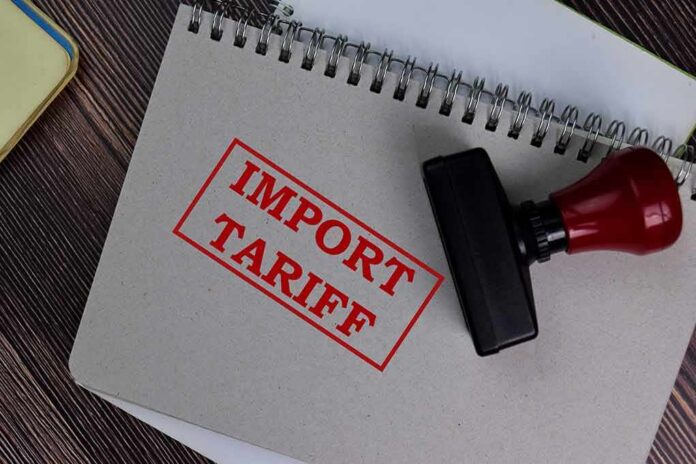 Notebook with import tariff stamp and red-handled rubber stamp