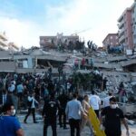 Hypersonic Hell Hits Kyiv — What Slipped Through? Rescue workers and civilians on collapsed building after earthquake